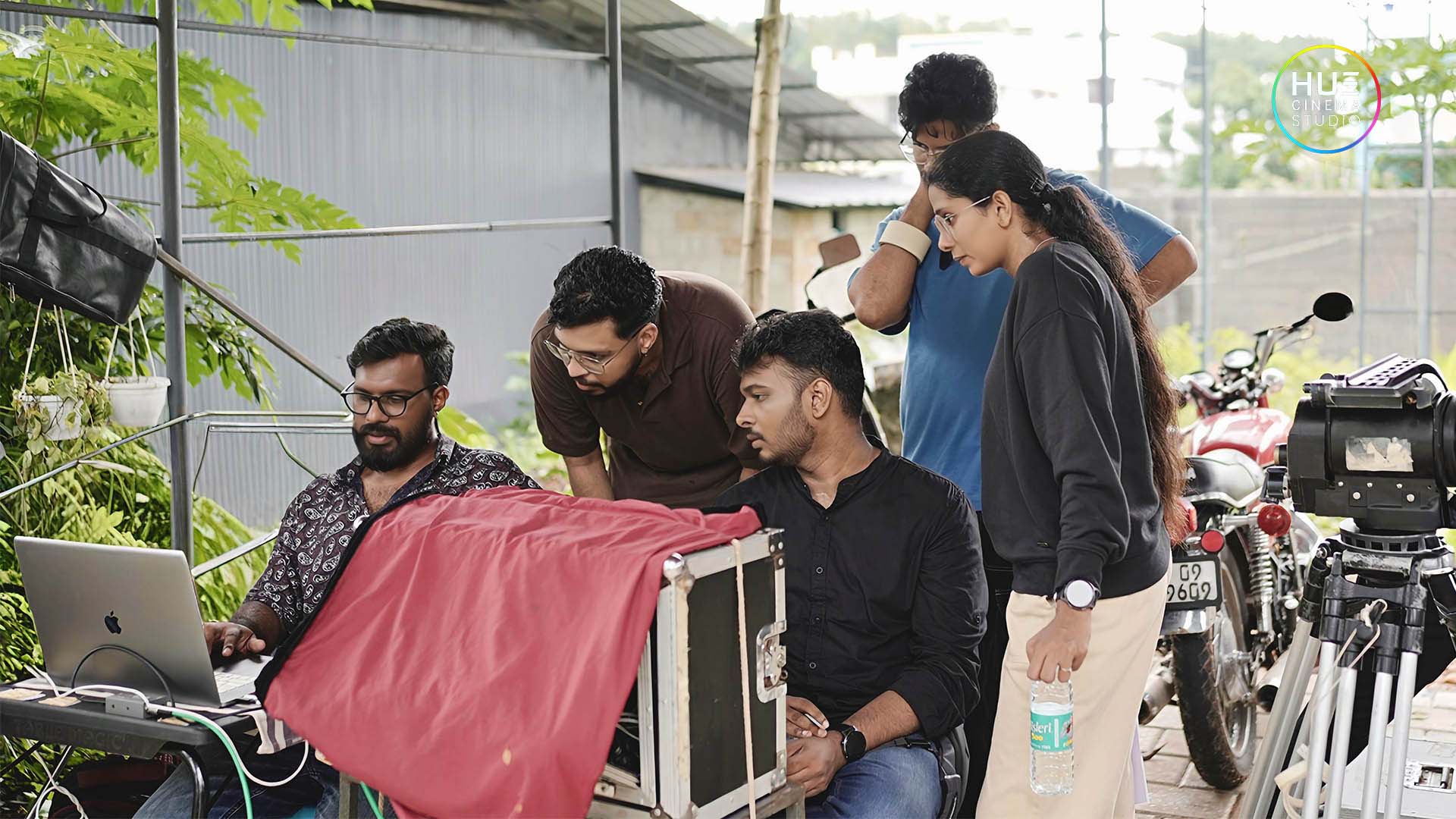 Hue Cinema Studio film crew with director Haran Reddi working together during behind the scenes of ad film production.