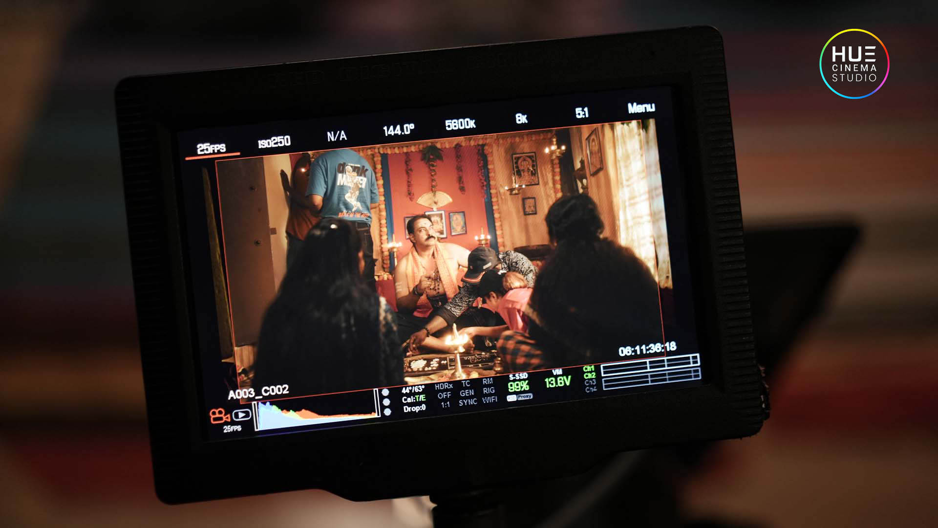 Behind the scenes of Hue Cinema Studio ad film shoot focusing on scene setup and shot framing with director Haran Reddi.